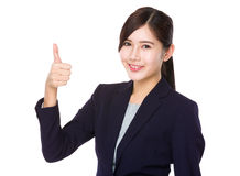 businesswoman-thumb-up-isolated-white-background-56814175